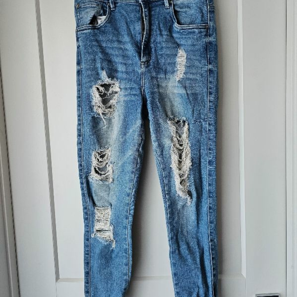 Distressed Blue Jeans